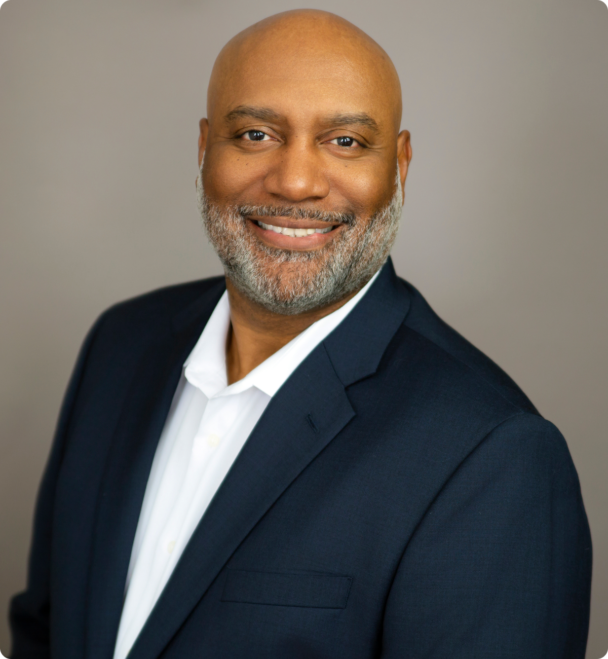 Smiling man in a suit portrait.